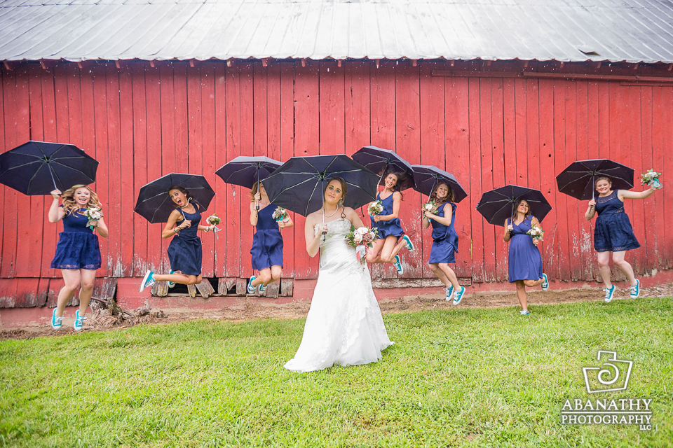 BEFORE: The rain hit just as the bridal party was ready for their portraits. Luckily, a bag of umbrellas saved the day!